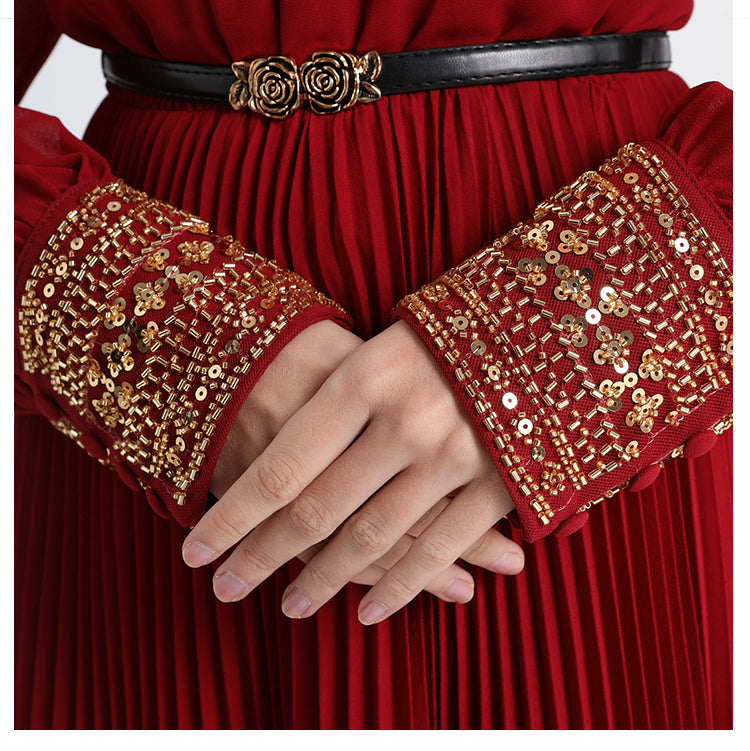 Original design premium pleated belt with gold beaded sequins draped over a chiffon pleated jumpsuit