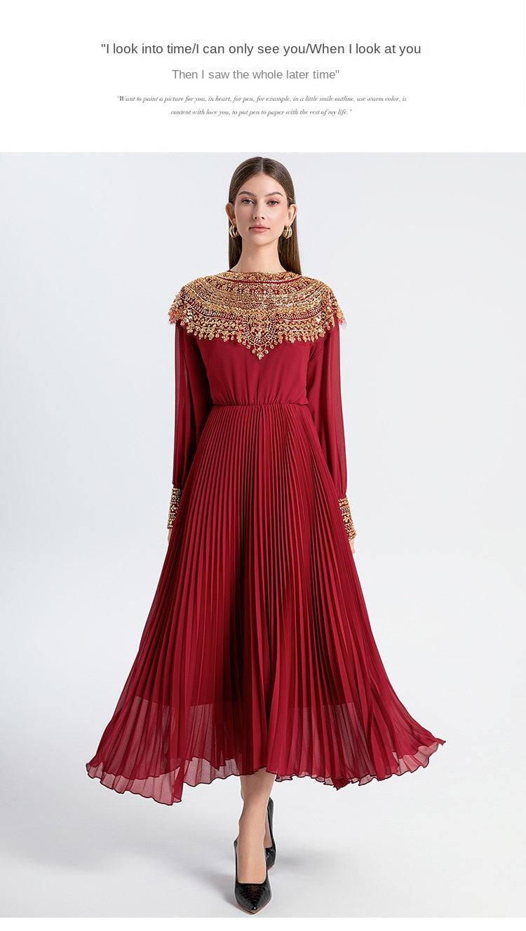 Original design premium pleated belt with gold beaded sequins draped over a chiffon pleated jumpsuit
