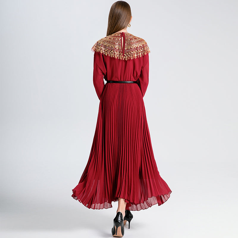 Original design premium pleated belt with gold beaded sequins draped over a chiffon pleated jumpsuit