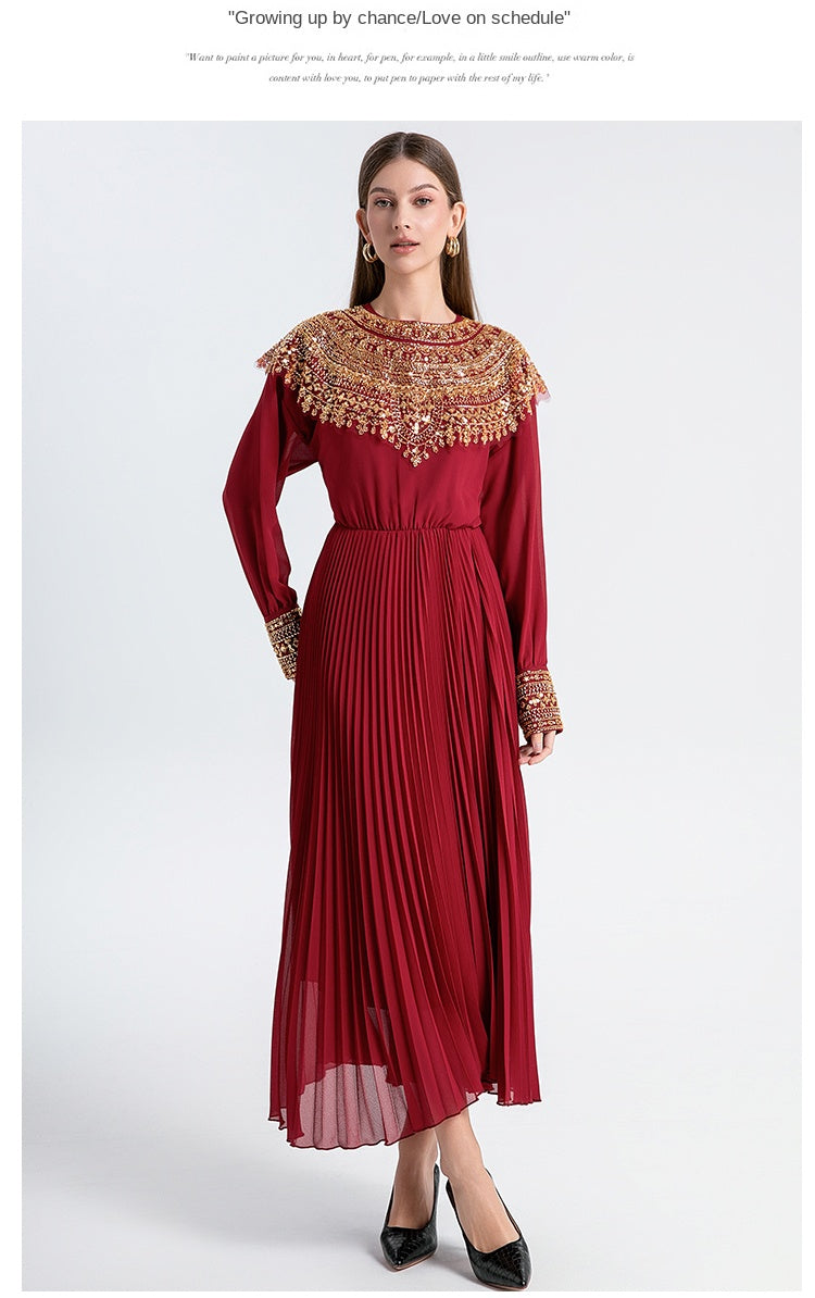 Original design premium pleated belt with gold beaded sequins draped over a chiffon pleated jumpsuit