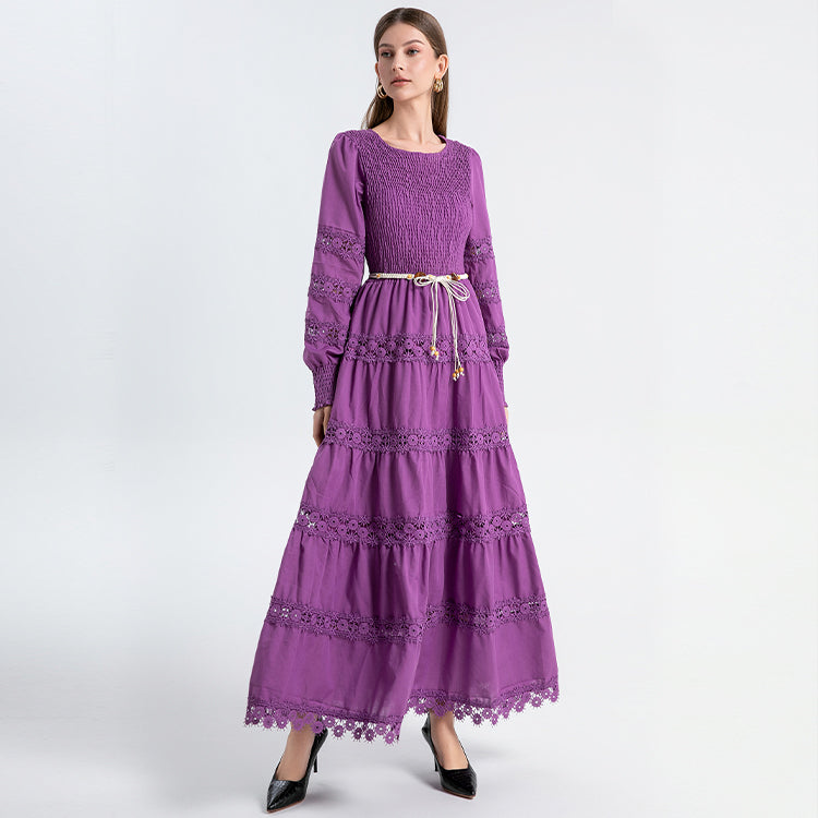 The French vintage maxi skirt is cut-out and laced in a solid color, cinching the waist and showing a slim round neck, lace panels