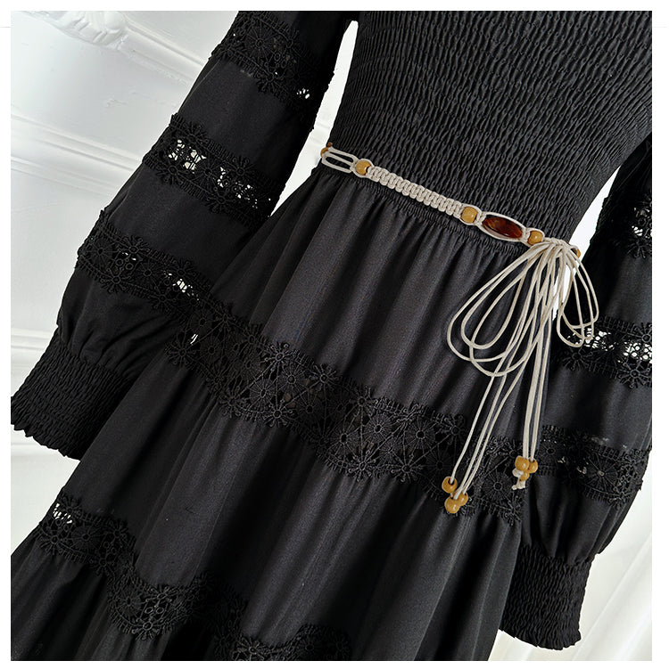 The French vintage maxi skirt is cut-out and laced in a solid color, cinching the waist and showing a slim round neck, lace panels