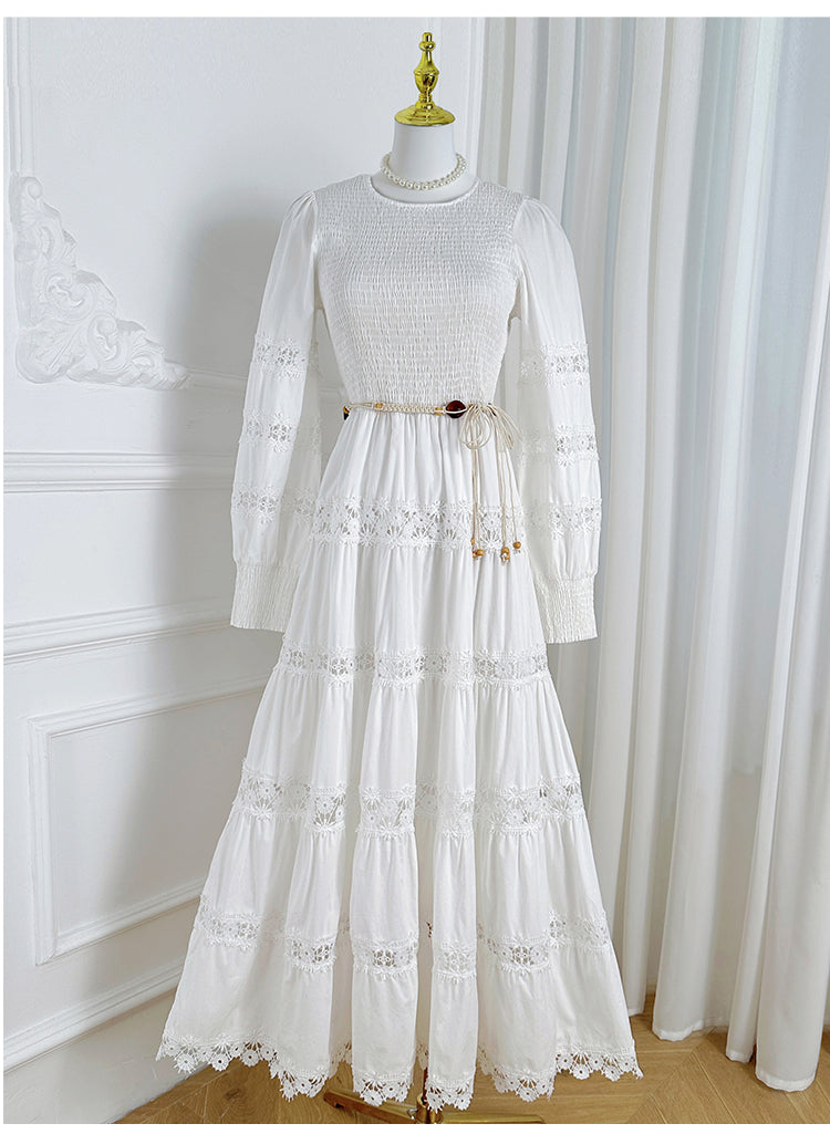 The French vintage maxi skirt is cut-out and laced in a solid color, cinching the waist and showing a slim round neck, lace panels