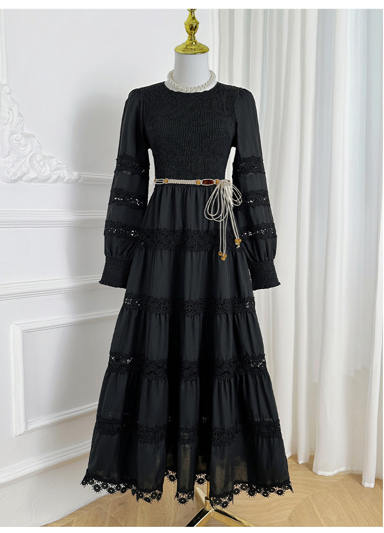 The French vintage maxi skirt is cut-out and laced in a solid color, cinching the waist and showing a slim round neck, lace panels