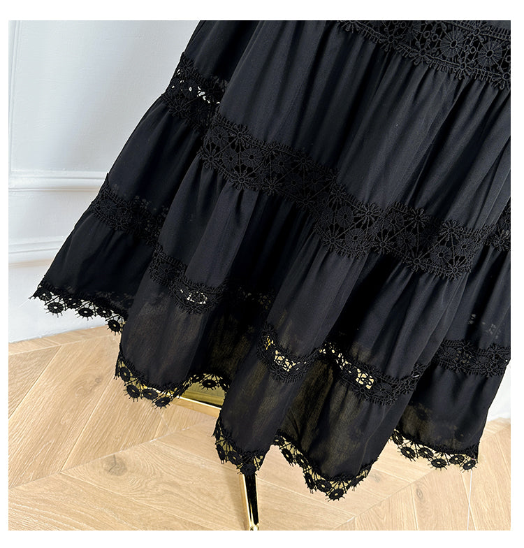 The French vintage maxi skirt is cut-out and laced in a solid color, cinching the waist and showing a slim round neck, lace panels